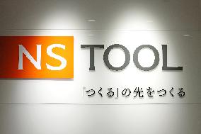 Nisshin Tools signboard and logo